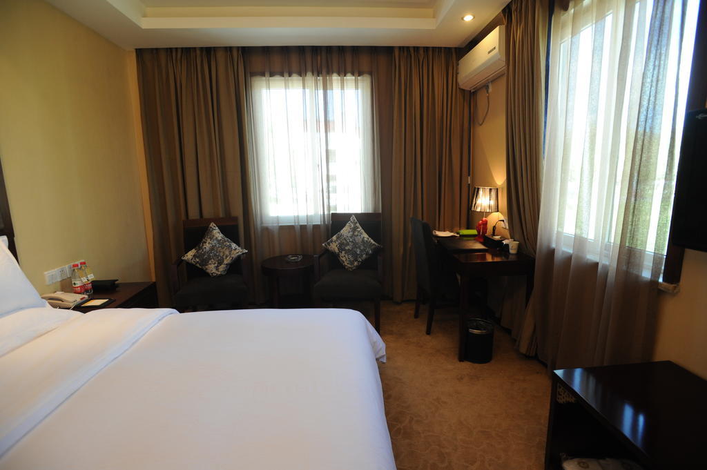 Wanrun International Resort Hotel In Tibet Xigaze Quarto foto